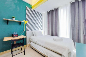 Minimalist Studio at Tree Park City BSD Apartment By Travelio